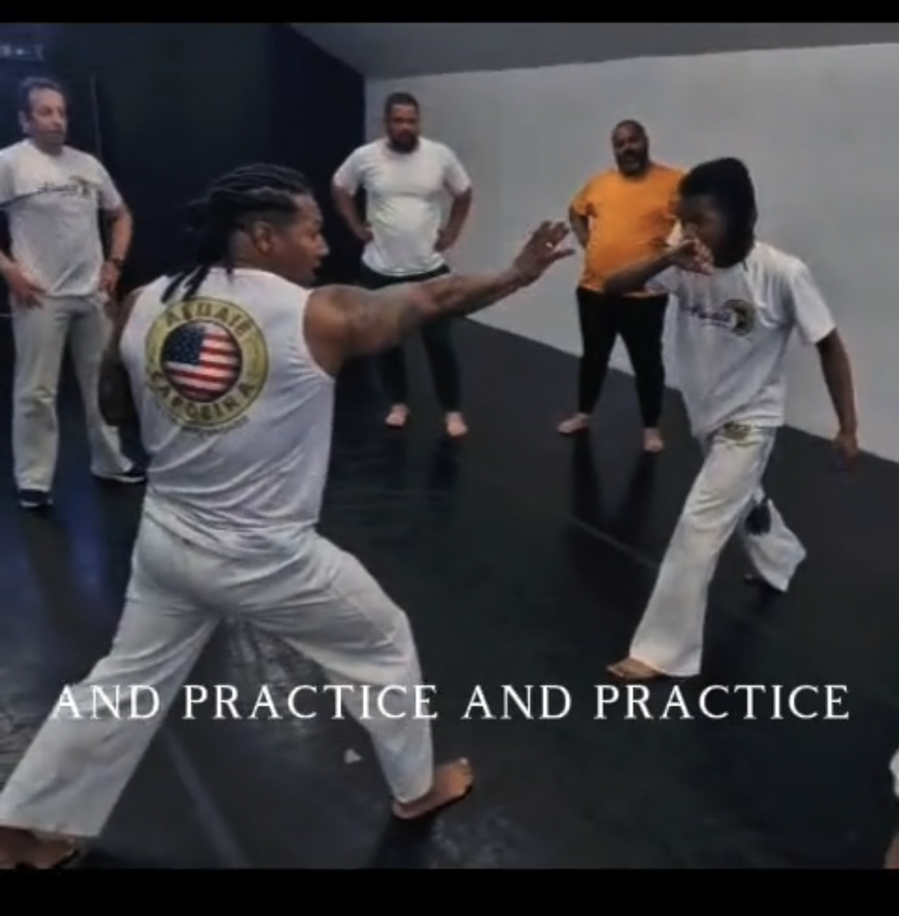 Jeff Oliveira teaching capoeira — controlled aggression, breath under pressure