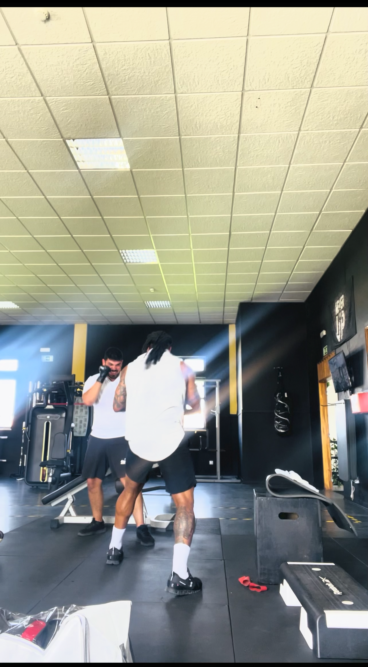 Jeff Oliveira sparring with a client — combat coaching